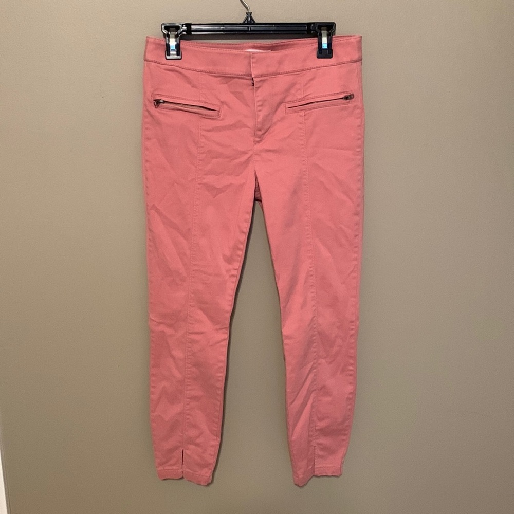 Loft pink skinny pants with small slits in bottom of pant.